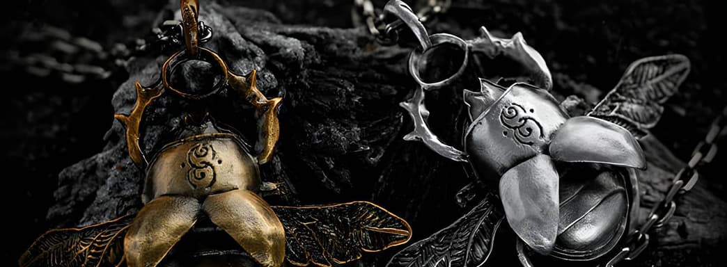 Starforged выпустила кулоны в виде Серебряного и Золотого скарабеев из Elden Ring