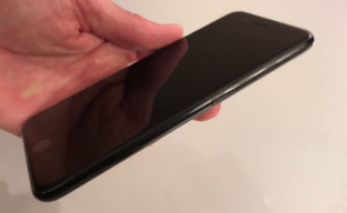 Full-Device Skins Causing 'iPhone' and Regulatory Labels to Peel Off Back of Jet Black iPhones