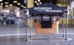 Amazon планирует доставляет посылки беспилотным дронами