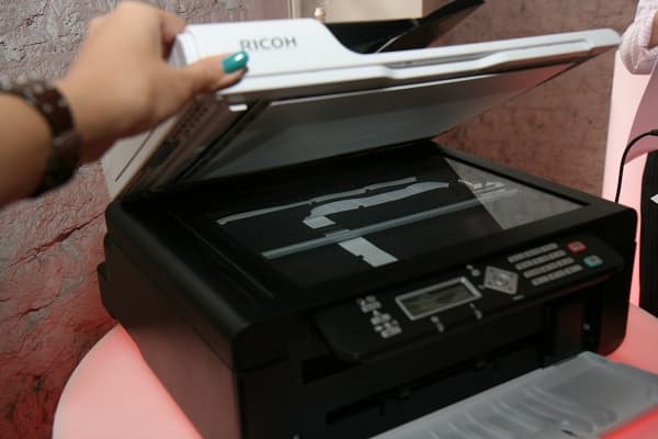 Монохромные МФУ начального уровня SP 100SU и SP 100SF