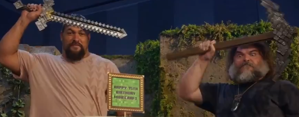 Jack Black and Jason Momoa from the Minecraft movie adaptation battled a cake for Mojang's 15th anniversary