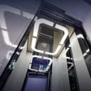 «Повторяет очертания салона авто»: Карачаровский механический завод и «Москвич» выпустили уникальную модель лифта