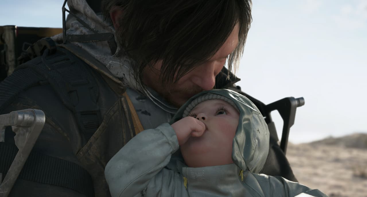 Death Stranding 2 gameplay screenshot showing Sam Porter Bridges in a snowy environment with his equipment.