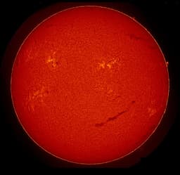 The Sun "smiled" and erupted in a powerful flare on February 13