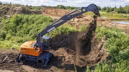 Устойчив к жаре, холоду и городу - все о новом российском колесном экскаваторе E200W