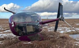 Ownerless overturned Robinson helicopter discovered in Kamchatka - no one around
