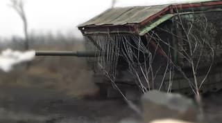 T-80BVM gas-turbine tanks were protected with a "kartuz": a new solution against drones