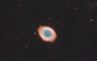 Roscosmos Showcases the Ring Nebula in the Lyra Constellation