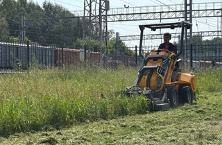 Baumech Showcased an Articulated Mini Loader with a Mower in Action