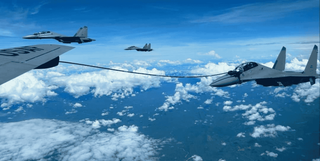 Впервые в истории: американский Boeing KC-135 заправил в воздухе российские истребители Су-30МКМ