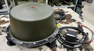 Enemy FPV Drone Covered by "Hood": EW System Protected Armored Vehicle of the Russian Armed Forces