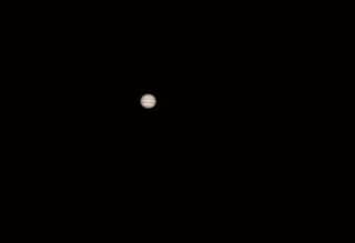 Unique Natural Shots of Jupiter from the ISS: Within Arm's Reach