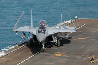 How the S-70 "Okhotnik" Works with the Su-57 Fighter: Indian MiG-29Ks May Receive Wingman Drones