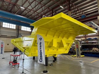 Russian-made Komatsu HD785 mining dump truck receives body from Severstal
