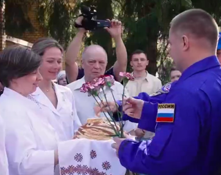 Cosmonauts Ovchinin and Wagner Return to Star City After Returning from the ISS