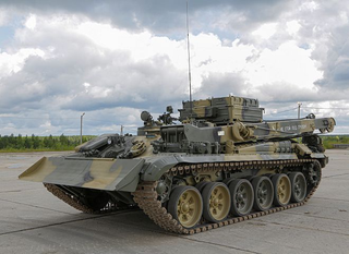 BREM-1M Based on T-90M "Proryv" Easily Hauled a 67-Ton Abrams on a Trailer from the Battlefield