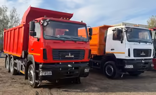 MAZ-5550S5 and MAZ-650128 dump trucks for transporting bulk cargo presented in the Mogilev region