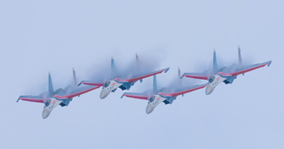 Russian Su-30SM and Su-35S Fighters Conquer Chinese Skies: Russian Aerospace Forces Aerobatic Team Performs at Airshow in Nanchang
