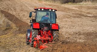 MZSh unveiled a new transformer plow - it folds up and loads the tractor's front wheels
