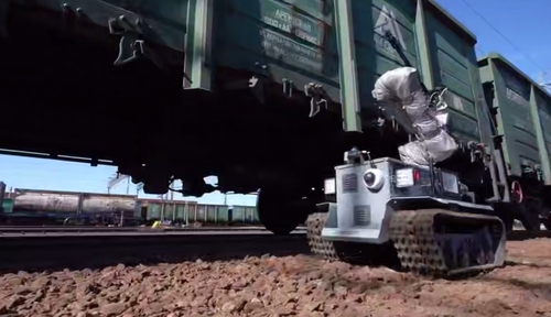 Robot nacional para la liberación y verificación automática de los frenos de los vagones de carga