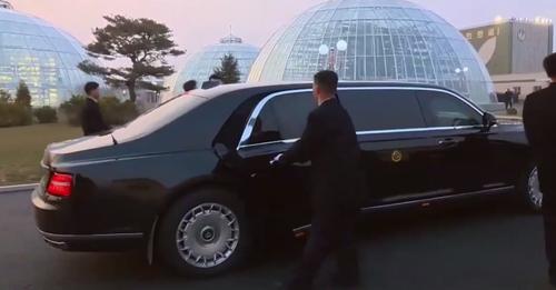 Test drive for Comrade Kim: North Korean leader rides Putin's gifted Aurus for the first time