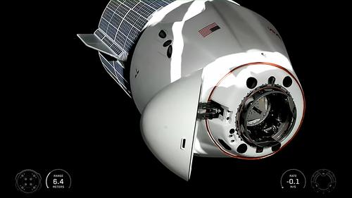 Crew Dragon spacecraft with cosmonaut Fedyaev and three astronauts docked with the ISS