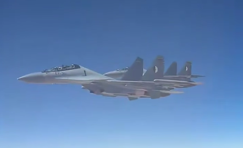 Su-30MKA of the Algerian Air Force escorting the Pope's plane