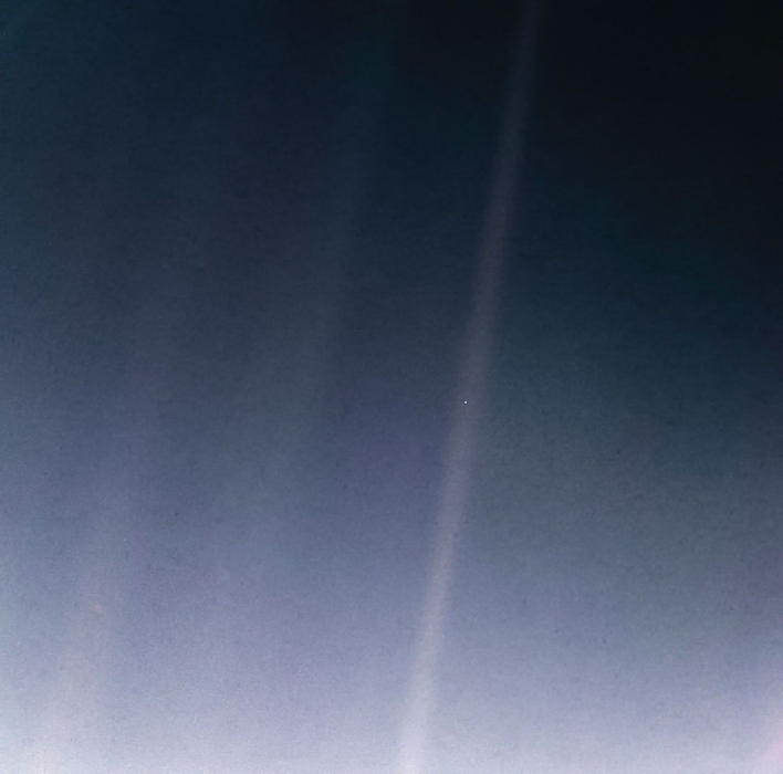 "The Pale Blue Dot." Restored photo from the Voyager-1 probe. 5.9 billion km from Earth