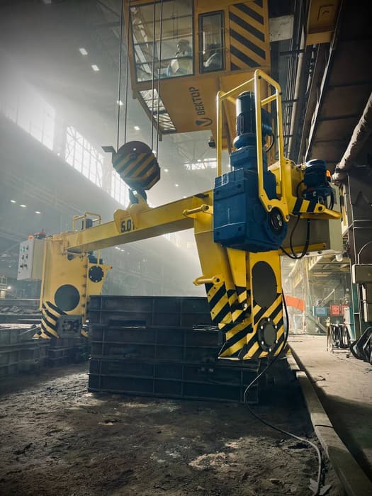 Volteador de cajas de moldeo