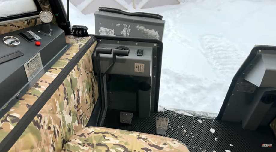 Instead of a steering wheel, the all-terrain vehicle has levers that direct the all-terrain vehicle left and right, if you release both levers at the same time, the brakes will work. The view from the driver's seat will be something like this<br>