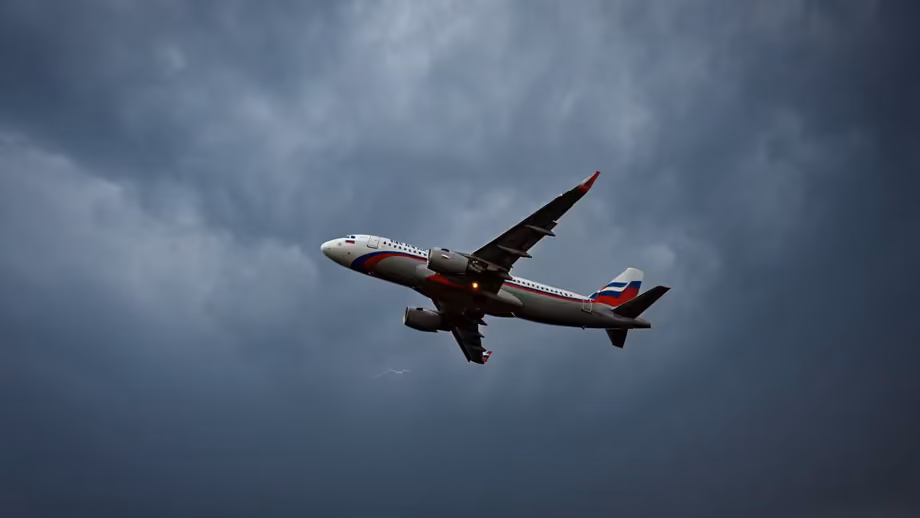Airplane in storm clouds
