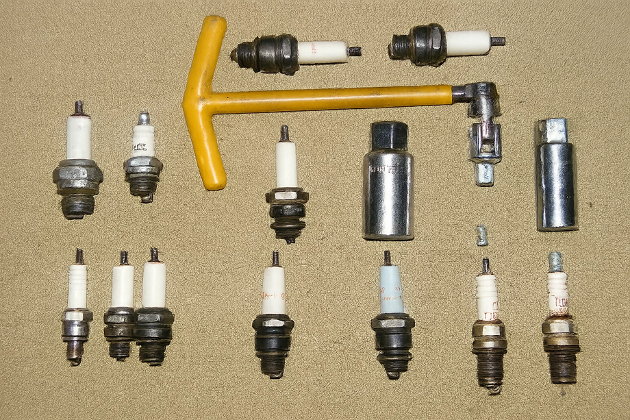 Spark plug wrench and different types of spark plugs