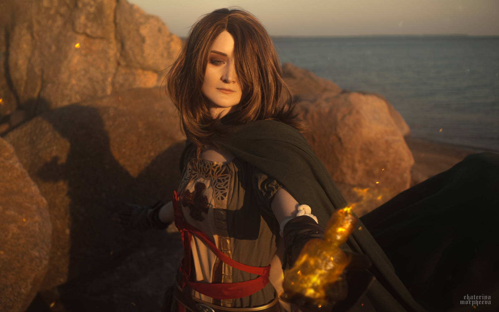 Reganight as Emerald Herald, a moody shot showcasing her full costume and ambiance