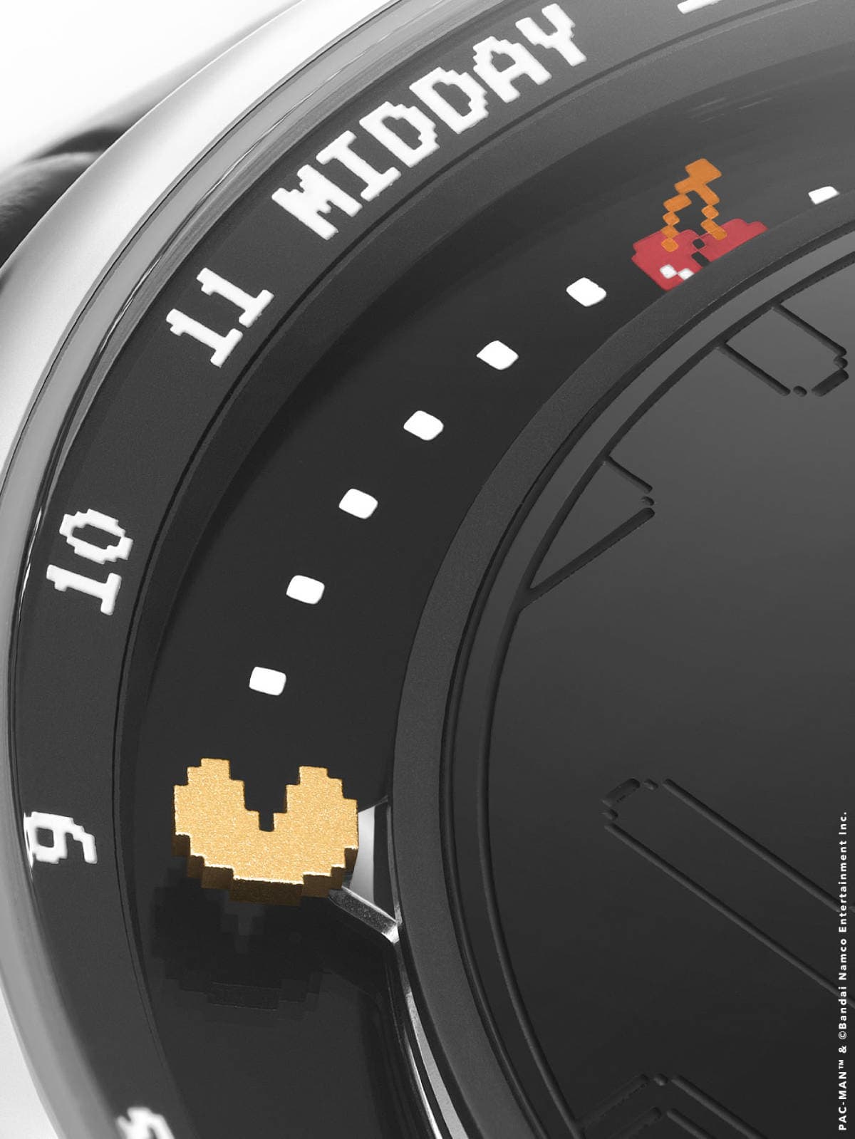 Detailed view of a Pac-Man character on the luxury watch
