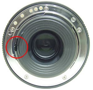 Рычаг управления открытием диафрагмы на объективе